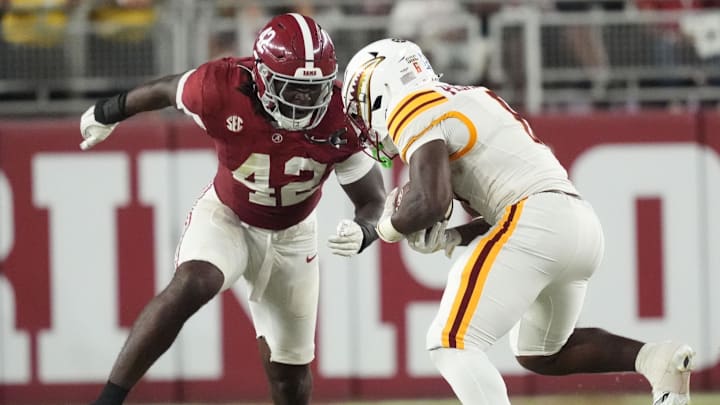 Sep 6, 2025; Tuscaloosa, Alabama, USA;  Alabama linebacker Yhonzae Pierre (42) closes to make a tackle on UL Monroe running back Zach Palmer-Smith (6) at Saban Field at Bryant-Denny Stadium. Alabama defeated UL Monroe 73-0. Mandatory Credit: Gary Cosby Jr.-Imagn Images