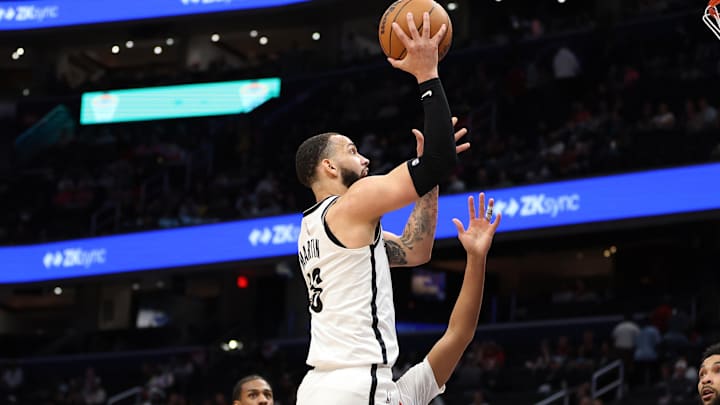 Mar 29, 2025; Washington, District of Columbia, USA; Brooklyn Nets guard Tyrese Martin (13) takes a shot during the first half against the Washington Wizards at Capital One Arena. Mandatory Credit: Daniel Kucin Jr.-Imagn Images