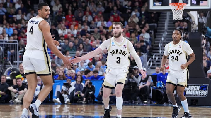 Purdue Boilermakers forward Trey Kaufman-Renn (4) and guard Braden Smith (3) react after a play Purdue Boilermakers forward Trey Kaufman-Renn (4) and guard Braden Smith (3) react after a play