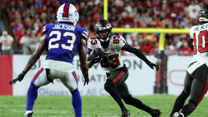 Tampa Bay Buccaneers wide receiver Tez Johnson (83) runs with the ball as Buffalo Bills cornerback Dane Jackson (23) defends during the second quarter at Raymond James Stadium.