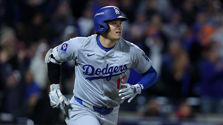 Oct 17, 2024; New York City, New York, USA; Los Angeles Dodgers two-way player Shohei Ohtani (17) reacts after hitting a solo home run against the New York Mets in the first inning during game four of the NLCS for the 2024 MLB playoffs at Citi Field. Mandatory Credit: Brad Penner-Imagn Images