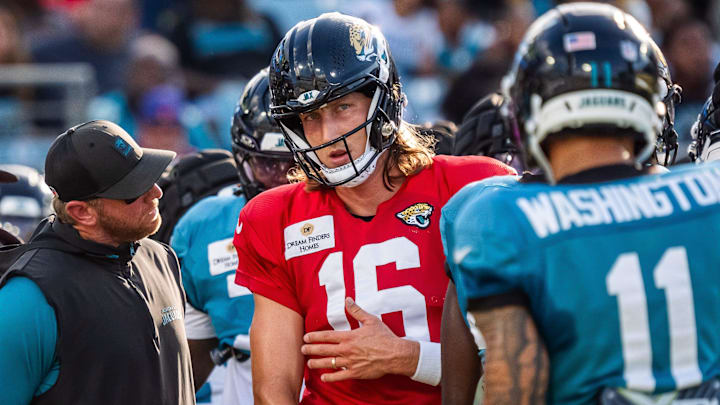 Jacksonville Jaguars head coach Liam Coen talks with Jacksonville Jaguars quarterback Trevor Lawrence (16) between plays before an NFL scrimmage at EverBank Stadium Friday August 1, 2025, in Jacksonville, Fla. [Doug Engle/Florida Times-Union]