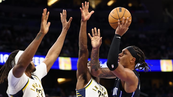 Oct 28, 2024; Orlando, Florida, USA; Orlando Magic forward Paolo Banchero (5) drives to the hoop past Indiana Pacers forward Aaron Nesmith (23) in the second quarter at Kia Center. Mandatory Credit: Nathan Ray Seebeck-Imagn Images Oct 28, 2024; Orlando, Florida, USA; Orlando Magic forward Paolo Banchero (5) drives to the hoop past Indiana Pacers forward Aaron Nesmith (23) in the second quarter at Kia Center. Mandatory Credit: Nathan Ray Seebeck-Imagn Images