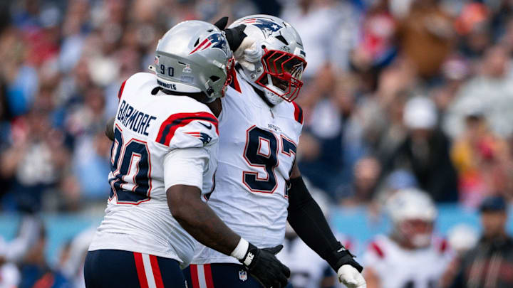 Oct 19, 2025; Nashville, Tennessee, USA;  New England Patriots defensive end Milton Williams (97) celebrates the sack of Tenn