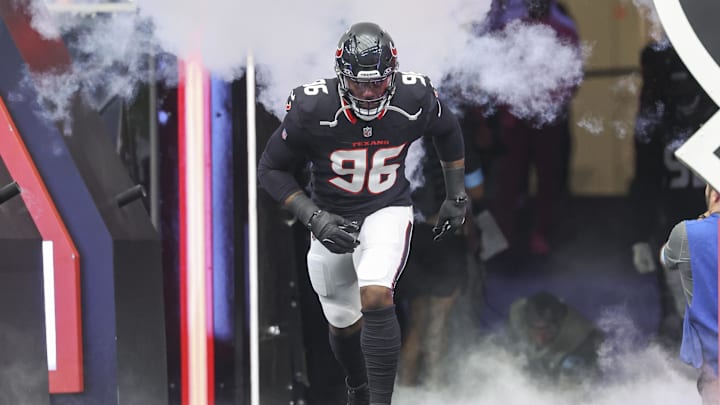 Oct 27, 2024; Houston, Texas, USA; Houston Texans defensive end Denico Autry (96) runs onto the field before the game against the Indianapolis Colts at NRG Stadium. Mandatory Credit: Troy Taormina-Imagn Images