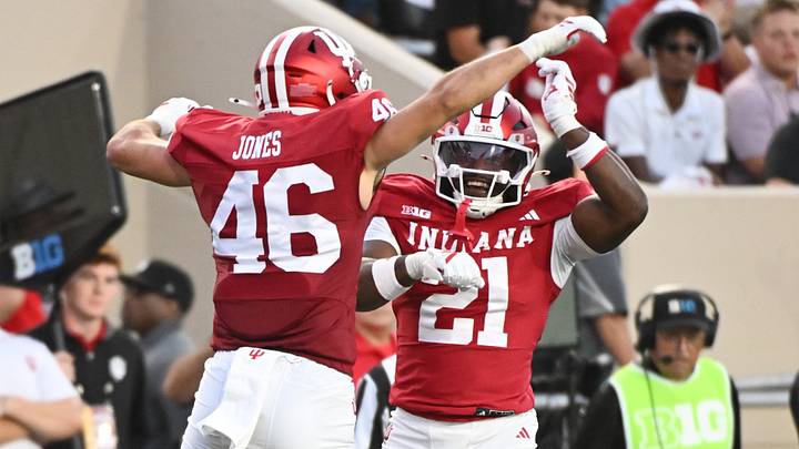 Sep 12, 2025; Bloomington, Indiana, USA; Indiana Hoosiers linebacker Isaiah Jones (46) and linebacker Rolijah Hardy (21) celebrate after a defensive play during the first half against the Indiana State Sycamores at Memorial Stadium. Mandatory Credit: Robert Goddin-Imagn Images