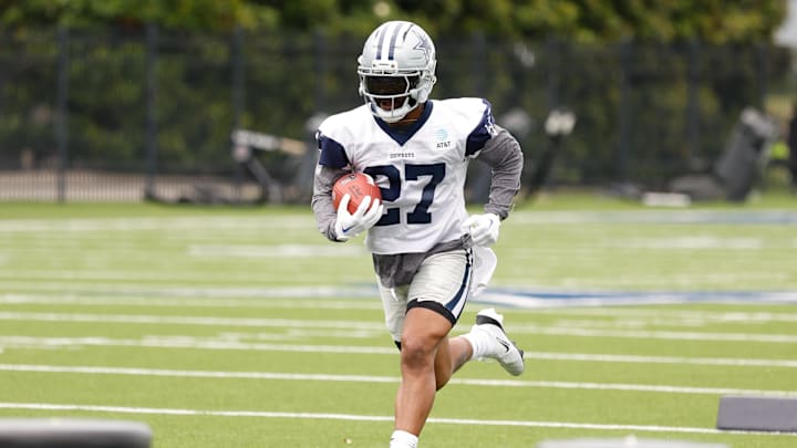 Jun 10, 2025; Arlington, TX, USA;  Dallas Cowboys running back Miles Sanders (27) goes through a drill during practice at the Ford Center at the Star Training Facility in Frisco, Texas. Mandatory Credit: Chris Jones-Imagn Images