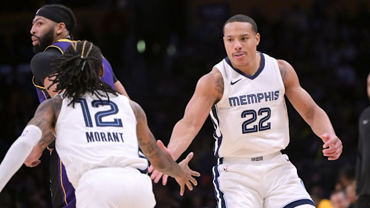 Memphis Grizzlies guard Desmond Bane (22) is congratulated by guard Ja Morant (12) after a three-point basket in the second half against the Los Angeles Lakers at Crypto.com Arena. Mandatory Credit: Jayne Kamin-Oncea-Imagn Images