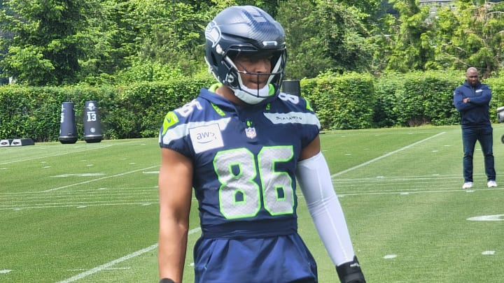 Seahawks tight end Pharaoh Brown listens to instructions during a drill in Thursday's OTA session at the VMAC.