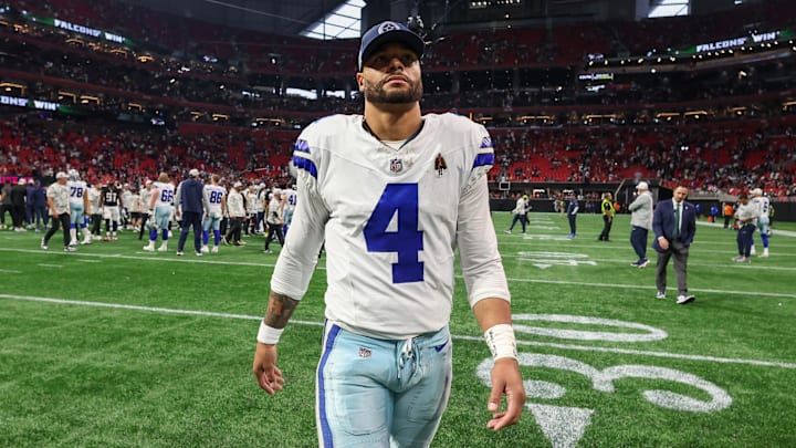 Dallas Cowboys quarterback Dak Prescott walks off the field after a game against the Atlanta Falcons.