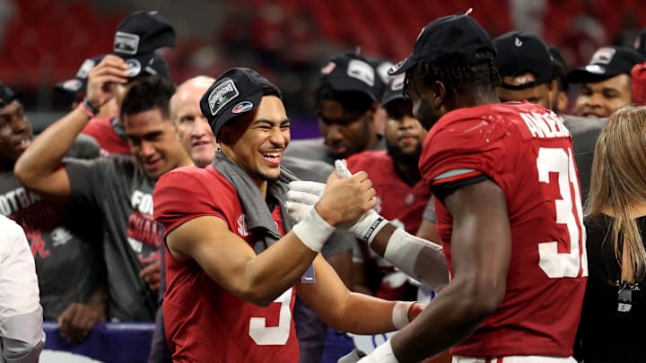 Dec 4, 2021; Atlanta, GA, USA; Alabama Crimson Tide quarterback Bryce Young (9) celebrates with linebacker Will Anderson Jr. (31) after their win during the SEC championship game.