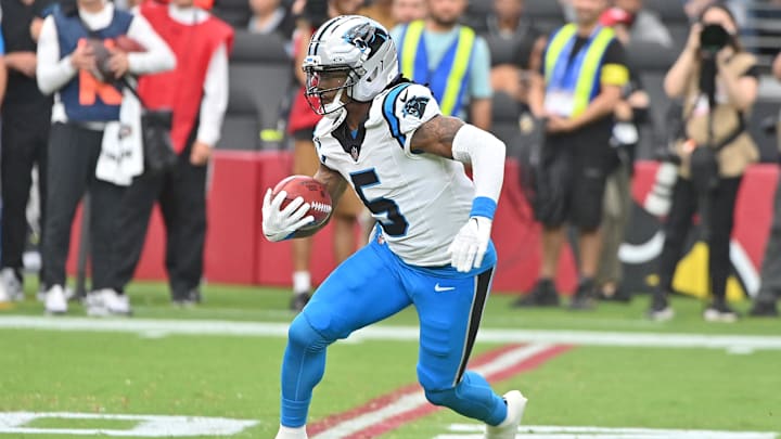 Carolina Panthers running back Rico Dowdle (5) runs the ball during the first quarter against the Arizona Cardinals at State Farm Stadium. Carolina Panthers running back Rico Dowdle (5) runs the ball during the first quarter against the Arizona Cardinals at State Farm Stadium.
