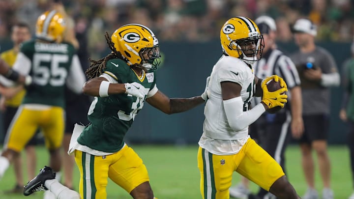 Green Bay Packers wide receiver Malik Heath catches a pass against Gregory Junior on Family Night. Green Bay Packers wide receiver Malik Heath catches a pass against Gregory Junior on Family Night.