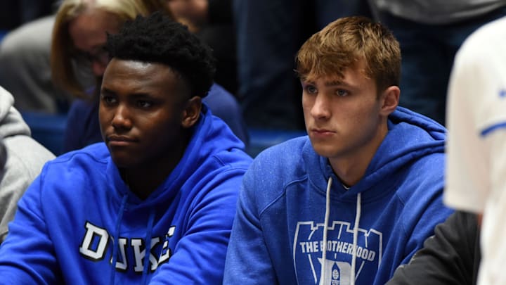 Mar 9, 2024; Durham, North Carolina, USA; Duke basketball players Patrick Ngongba (left) and Cooper Flagg look on prior to a game against the North Carolina Tar Heels at Cameron Indoor Stadium.