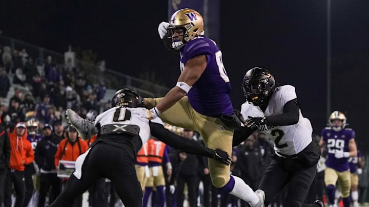 Quentin Moore goes airborne for more yardage. 