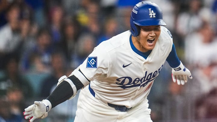 Los Angeles Dodgers designated hitter Shohei Ohtani (17) celebrates as he runs for first on an RBI single in the sixth inning of the MLB National League Wild Card Game 2 between the Los Angeles Dodgers and the Cincinnati Reds at Dodger Stadium in Los Angeles on Wednesday, Oct. 1, 2025. The Reds were eliminated from the postseason with an 8-4 loss to the reigning World Series Champions Dodgers. Los Angeles Dodgers designated hitter Shohei Ohtani (17) celebrates as he runs for first on an RBI single in the sixth inning of the MLB National League Wild Card Game 2 between the Los Angeles Dodgers and the Cincinnati Reds at Dodger Stadium in Los Angeles on Wednesday, Oct. 1, 2025. The Reds were eliminated from the postseason with an 8-4 loss to the reigning World Series Champions Dodgers.