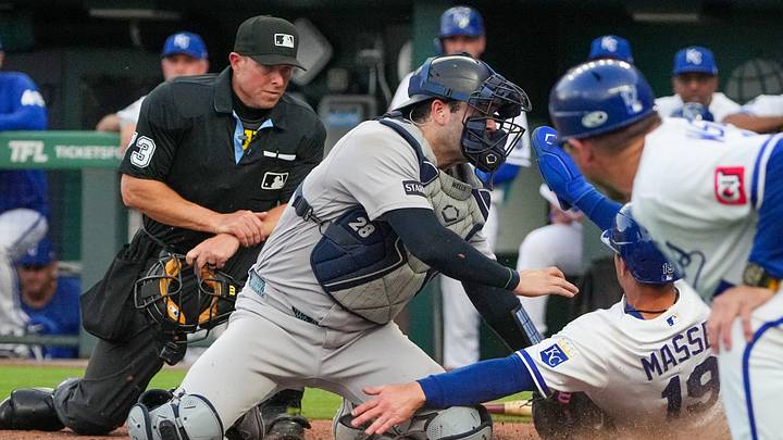 May 27, 2026; Kansas City, Missouri, USA; Kansas City Royals second baseman Michael Massey (19) is tagged out by New York Yankees catcher Austin Wells (28) at home during the third inning at Kauffman Stadium. Mandatory Credit: Denny Medley-Imagn Images May 27, 2026; Kansas City, Missouri, USA; Kansas City Royals second baseman Michael Massey (19) is tagged out by New York Yankees catcher Austin Wells (28) at home during the third inning at Kauffman Stadium. Mandatory Credit: Denny Medley-Imagn Images