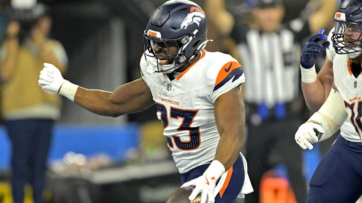 Dec 19, 2024; Inglewood, California, USA;  Denver Broncos running back Audric Estime (23) celebrates after a touchdown in the first half against the Los Angeles Chargers at SoFi Stadium. Mandatory Credit: Jayne Kamin-Oncea-Imagn Images
