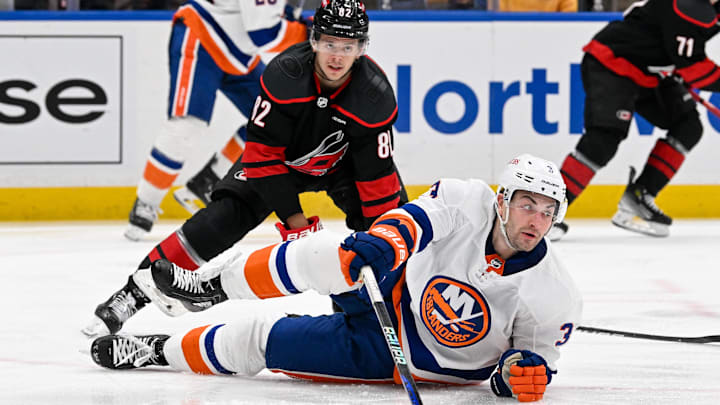 Mar 19, 2024; Elmont, New York, USA; New York Islanders defenseman Adam Pelech (3) and Carolina