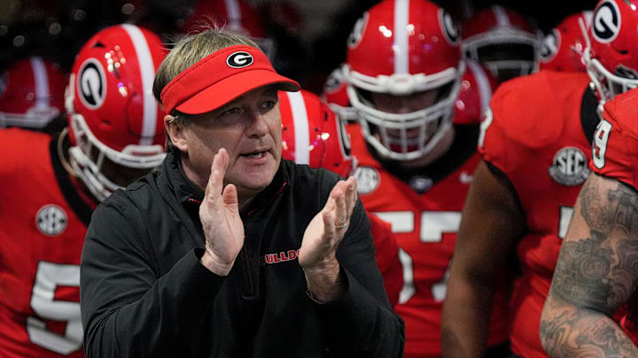 Georgia coach Kirby Smart takes the field with his team before the start of the SEC championship game against Texas in Atlanta, on Saturday, Dec. 7, 2024.