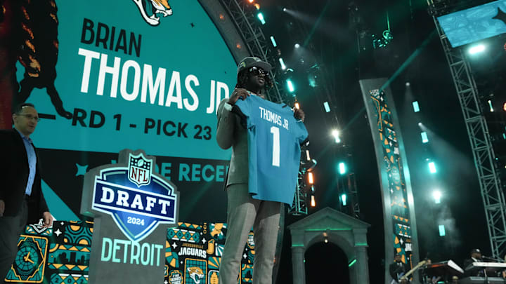 Apr 25, 2024; Detroit, MI, USA; LSU Tigers wide receiver Brian Thomas Jr. poses after being selected