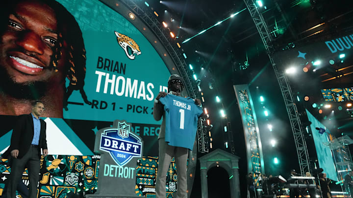 Apr 25, 2024; Detroit, MI, USA; LSU Tigers wide receiver Brian Thomas Jr. poses after being selected by the Jacksonville Jaguars as the No. 23 pick during the first round of the 2024 NFL Draft at Campus Martius Park and Hart Plaza. Mandatory Credit: Kirby Lee-Imagn Images