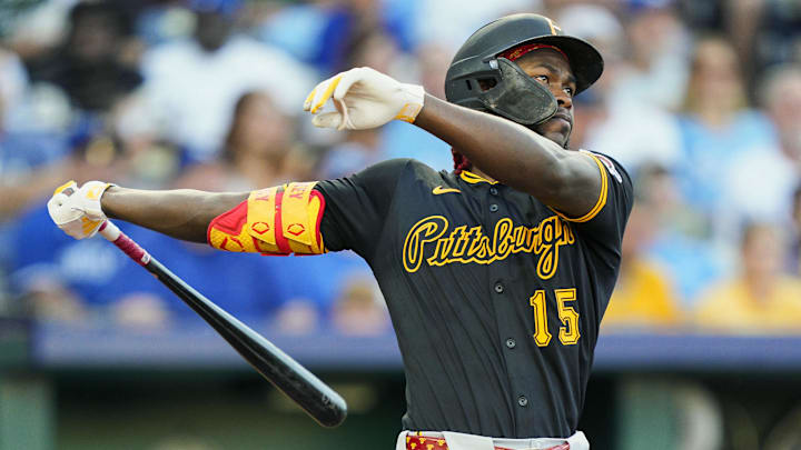 Jul 8, 2025; Kansas City, Missouri, USA; Pittsburgh Pirates center fielder Oneil Cruz (15) hits a home run during the fifth inning against the Kansas City Royals at Kauffman Stadium. Mandatory Credit: Jay Biggerstaff-Imagn Images
