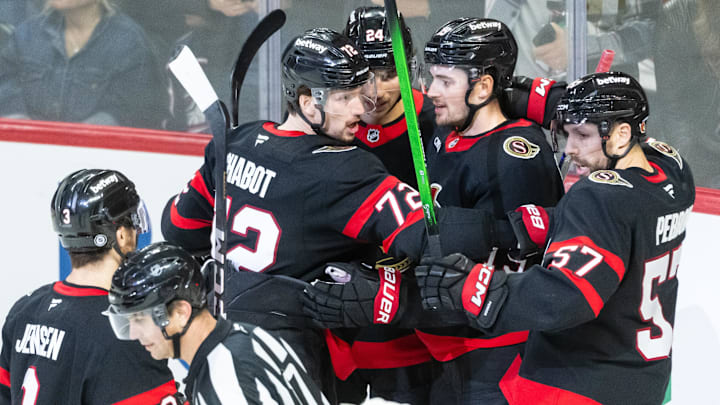 Apr 6, 2025; Ottawa, Ontario, CAN; Ottawa Senators Lleft wingDavid Perron (57) celebrates with team his goal scored in the third period against the Columbus Blue Jackets at the Canadian Tire Centre. Mandatory Credit: Marc DesRosiers-Imagn Images