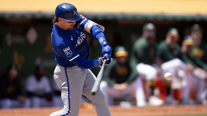 Jun 20, 2024; Oakland, California, USA; Kansas City Royals shortstop Bobby Witt Jr. (7) hits a home run against the Oakland Athletics during the eighth inning at Oakland-Alameda County Coliseum. 