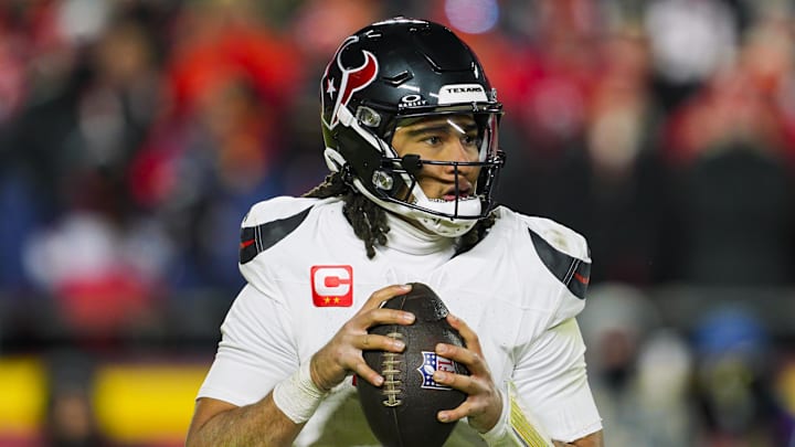 Jan 18, 2025; Kansas City, Missouri, USA; Houston Texans quarterback C.J. Stroud (7) drops back to pass during the second half against the Kansas City Chiefs in a 2025 AFC divisional round game at GEHA Field at Arrowhead Stadium. Mandatory Credit: Jay Biggerstaff-Imagn Images Jan 18, 2025; Kansas City, Missouri, USA; Houston Texans quarterback C.J. Stroud (7) drops back to pass during the second half against the Kansas City Chiefs in a 2025 AFC divisional round game at GEHA Field at Arrowhead Stadium. Mandatory Credit: Jay Biggerstaff-Imagn Images