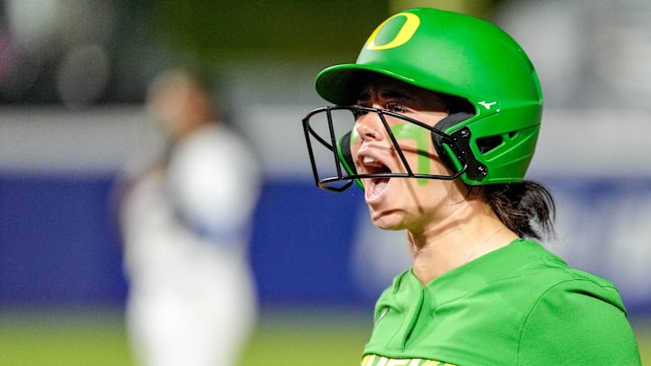 Oregon infielder Kaylynn Jones (3) celebrates a base hit in the third inning during a softball game between UCLA and Oregon at the Women’s College World Series at Devon Park in Oklahoma City, on Thursday, May 29, 2025. Oregon infielder Kaylynn Jones (3) celebrates a base hit in the third inning during a softball game between UCLA and Oregon at the Women’s College World Series at Devon Park in Oklahoma City, on Thursday, May 29, 2025.