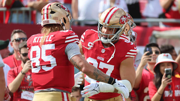 Nov 10, 2024; Tampa, Florida, USA; San Francisco 49ers tight end George Kittle (85) and defensive end Nick Bosa (97) prior to the game against the Tampa Bay Buccaneers at Raymond James Stadium. Mandatory Credit: Kim Klement Neitzel-Imagn Images