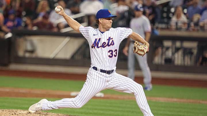 Aug 28, 2023; New York City, New York, USA; New York Mets relief pitcher Trevor Gott (33) delivers a pitch during the ninth inning against the Texas Rangers at Citi Field. Mandatory Credit: Vincent Carchietta-USA TODAY Sports Aug 28, 2023; New York City, New York, USA; New York Mets relief pitcher Trevor Gott (33) delivers a pitch during the ninth inning against the Texas Rangers at Citi Field. Mandatory Credit: Vincent Carchietta-USA TODAY Sports