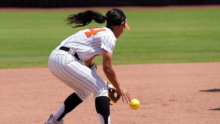 Oklahoma State infielder Tallen Edwards (44) chases after the ball in the fifth inning of a Big 12 softball tournament game between the Oklahoma State Cowgirls and the Arizona State Sun Devils at Devon Park in Oklahoma City, Thursday, May 8, 2025.