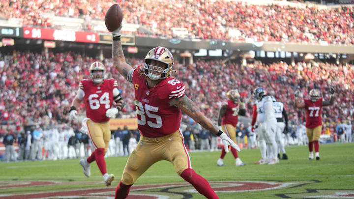 Dec 14, 2025; Santa Clara, California, USA;  San Francisco 49ers tight end George Kittle (85) scores a touchdown during the third quarter against the Tennessee Titans at Levi's Stadium. Mandatory Credit: Cary Edmondson-Imagn Images