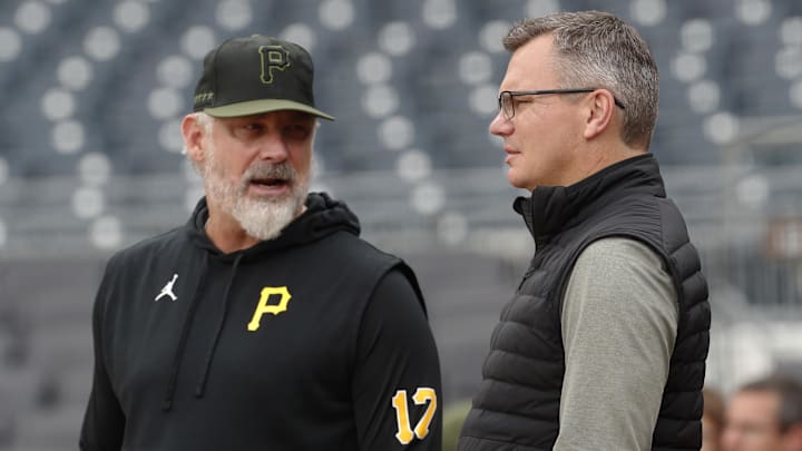 May 6, 2024; Pittsburgh, Pennsylvania, USA;  Pittsburgh Pirates manager Derek Shelton (17) and general manager Ben Cherington (right) talk on the field before the game against the Los Angeles Angels at PNC Park. Mandatory Credit: Charles LeClaire-Imagn Images
