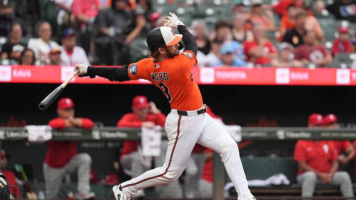 Aug 2, 2026; Baltimore, Maryland, USA; Baltimore Orioles designated hitter Taylor Ward (3) hits a single against the Philadelphia Phillies during the fourth inning at Oriole Park at Camden Yards. Mandatory Credit: Gregory Fisher-Imagn Images