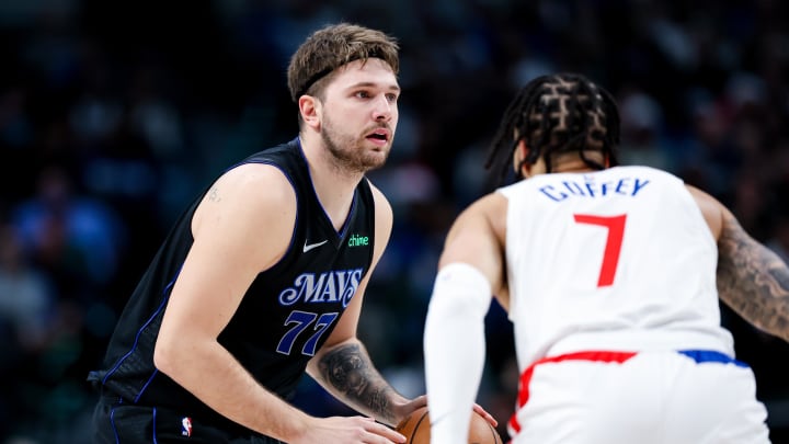 Dec 20, 2023; Dallas, Texas, USA; Dallas Mavericks guard Luka Doncic (77) controls the ball as LA Dec 20, 2023; Dallas, Texas, USA; Dallas Mavericks guard Luka Doncic (77) controls the ball as LA