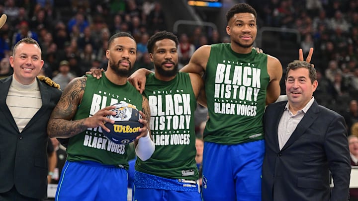 Feb 12, 2024; Milwaukee, Wisconsin, USA; NBA All-Star participants Milwaukee Bucks guard Damian Lillard (0), guard Malik Beasley (5), and forward Giannis Antetokounmpo (34) pose for a picture with general manager Jon Horst (far left) and team president Peter Feigin (far right) before a game against the Denver Nuggets at Fiserv Forum. Mandatory Credit: Benny Sieu-Imagn Images Feb 12, 2024; Milwaukee, Wisconsin, USA; NBA All-Star participants Milwaukee Bucks guard Damian Lillard (0), guard Malik Beasley (5), and forward Giannis Antetokounmpo (34) pose for a picture with general manager Jon Horst (far left) and team president Peter Feigin (far right) before a game against the Denver Nuggets at Fiserv Forum. Mandatory Credit: Benny Sieu-Imagn Images