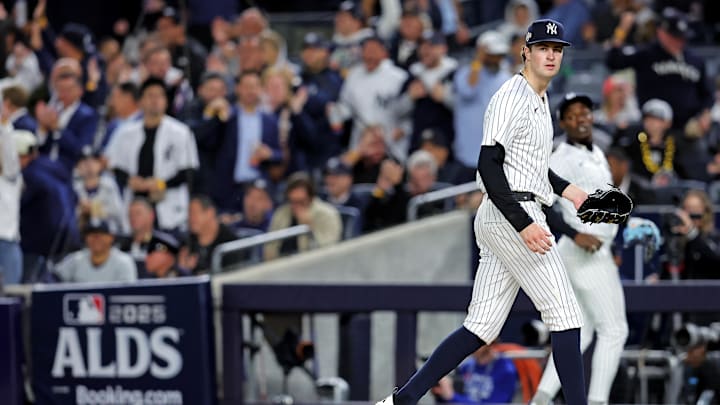 Oct 8, 2025; Bronx, New York, USA; New York Yankees pitcher Cam Schlittler (31) celebrates after the sixth inning against the Toronto Blue Jays during game four of the ALDS round for the 2025 MLB playoffs at Yankee Stadium. Mandatory Credit: Brad Penner-Imagn Images