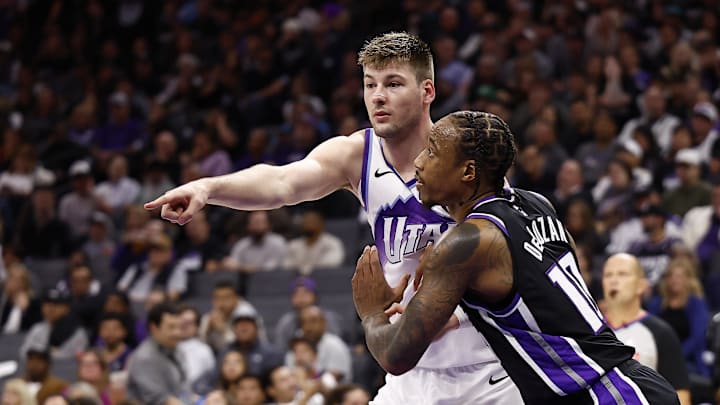 Oct 24, 2025; Sacramento, California, USA; Utah Jazz forward Kyle Filipowski (22) calls for a lane violation as he boxes out against Sacramento Kings forward/guard DeMar DeRozan (10) during the fourth quarter at Golden 1 Center. Mandatory Credit: Kelley L Cox-Imagn Images Oct 24, 2025; Sacramento, California, USA; Utah Jazz forward Kyle Filipowski (22) calls for a lane violation as he boxes out against Sacramento Kings forward/guard DeMar DeRozan (10) during the fourth quarter at Golden 1 Center. Mandatory Credit: Kelley L Cox-Imagn Images