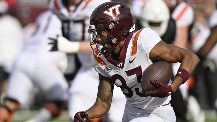 Nov 4, 2023; Louisville, Kentucky, USA;  Virginia Tech Hokies wide receiver Jaylin Lane (83) runs the ball against the Louisville Cardinals during the first half at L&N Federal Credit Union Stadium. Louisville defeated Virginia Tech 34-3. Mandatory Credit: Jamie Rhodes-USA TODAY Sports