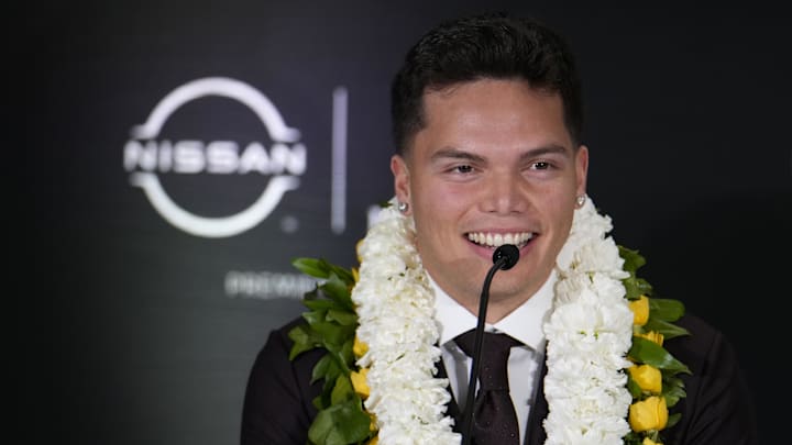 Dec 14, 2024; New York, NY, USA; Oregon Ducks quarterback Dillon Gabriel speaks on stage during a press conference before the 2024 Heisman Trophy Presentation. Mandatory Credit: Lucas Boland-Imagn Images
