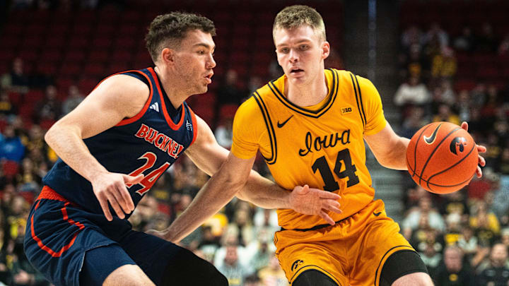 Bucknell's Achile Spadone guards Iowa's Bennett Stirtz Bucknell's Achile Spadone guards Iowa's Bennett Stirtz