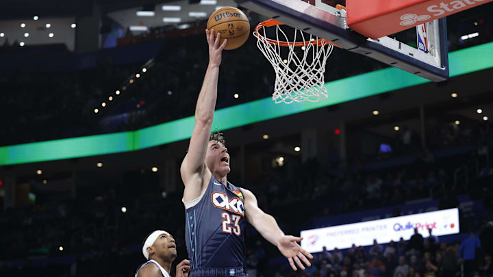 Dec 5, 2025; Oklahoma City, Oklahoma, USA; Oklahoma City Thunder forward Brooks Barnhizer (23) goes up for a basket against the Dallas Mavericks during the second half at Paycom Center. Dec 5, 2025; Oklahoma City, Oklahoma, USA; Oklahoma City Thunder forward Brooks Barnhizer (23) goes up for a basket against the Dallas Mavericks during the second half at Paycom Center.