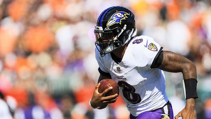 Oct 6, 2024; Cincinnati, Ohio, USA; Baltimore Ravens quarterback Lamar Jackson (8) runs with the ball against the Cincinnati Bengals in the first half at Paycor Stadium. Mandatory Credit: Katie Stratman-Imagn Images