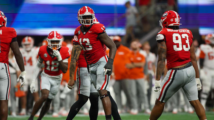 Aug 31, 2024; Atlanta, Georgia, USA; Georgia Bulldogs defensive lineman Mykel Williams (13) celebrates after a tackle against the Clemson Tigers in the third quarter at Mercedes-Benz Stadium. Mandatory Credit: Brett Davis-Imagn Images