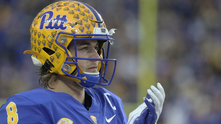 Pittsburgh Panthers quarterback Kenny Pickett passed Dan Marino's single-season record for touchdown passes at Pitt in 2021.