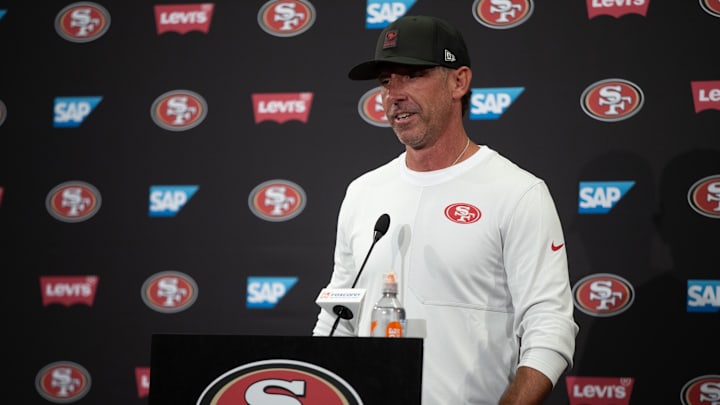 Jul 23, 2025; Santa Clara, CA, USA; San Francisco 49ers head coach Kyle Shanahan answers questions from reporters following the first day of training camp at SAP Performance Facility. Mandatory Credit: D. Ross Cameron-Imagn Images Jul 23, 2025; Santa Clara, CA, USA; San Francisco 49ers head coach Kyle Shanahan answers questions from reporters following the first day of training camp at SAP Performance Facility. Mandatory Credit: D. Ross Cameron-Imagn Images