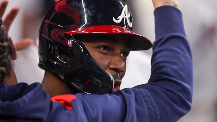 Atlanta Braves center fielder Michael Harris II (23) celebrates with teammates after driving in a run against the St. Louis Cardinals in the eighth inning at Truist Park.